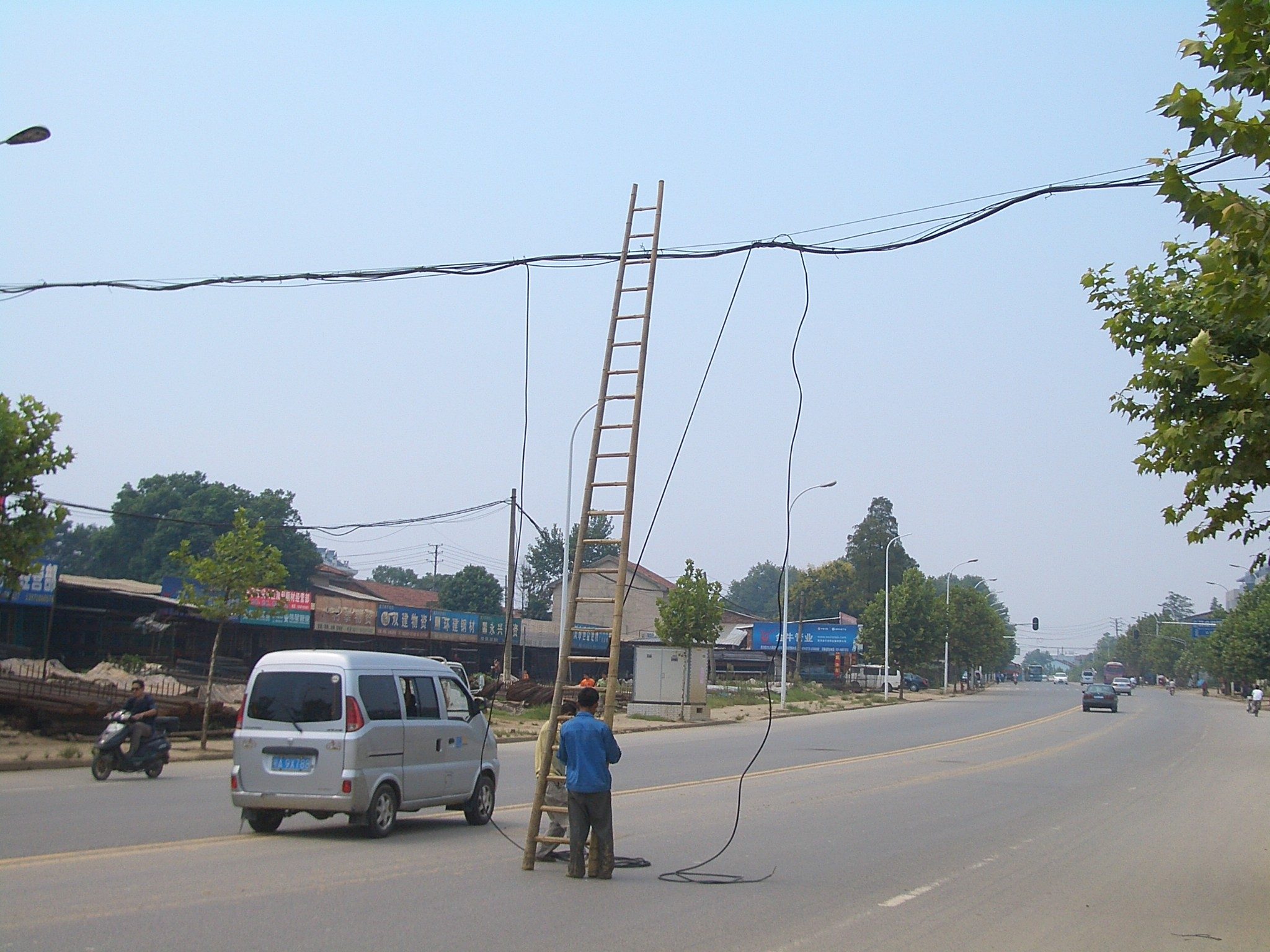 Don't set the ladder too close to electrical lines