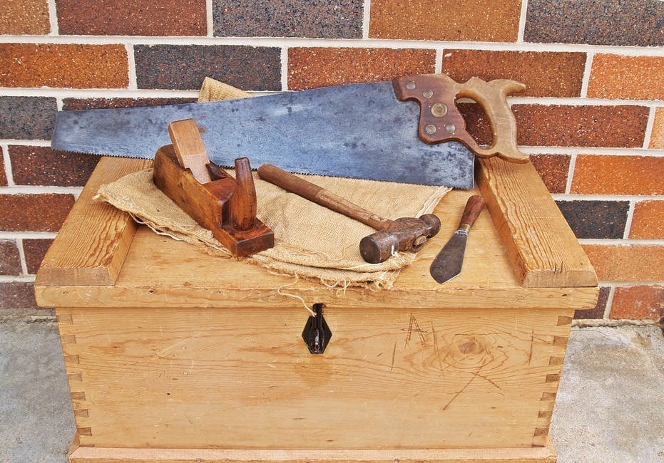 a tool box with woodworking tools